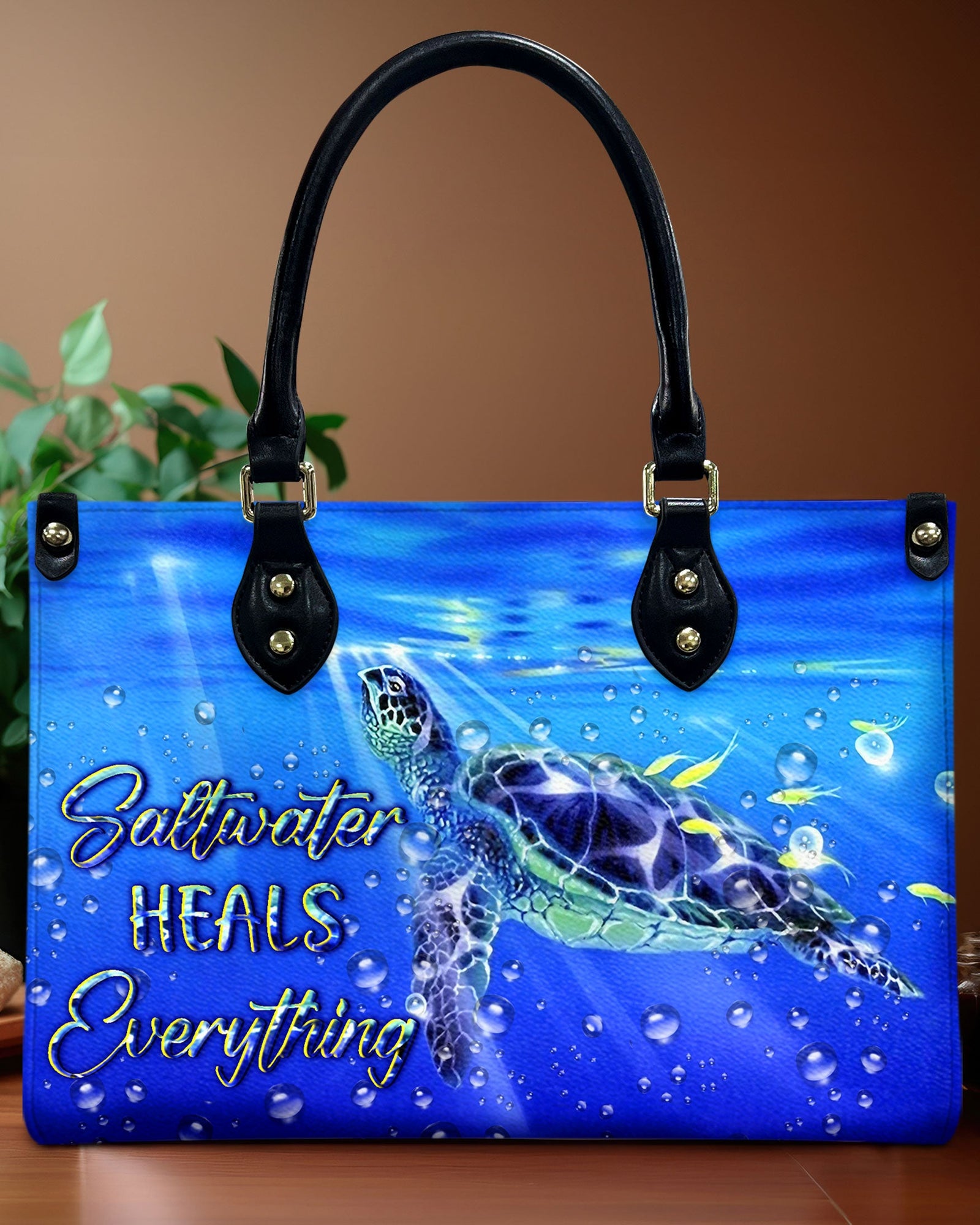 BLISSCORNERS SALTWATER HEALS EVERYTHING TURTLE LEATHER HANDBAG