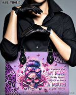 BLISSCORNERS A MOUTH I CAN'T CONTROL MESSY BUN SKULL LEATHER HANDBAG