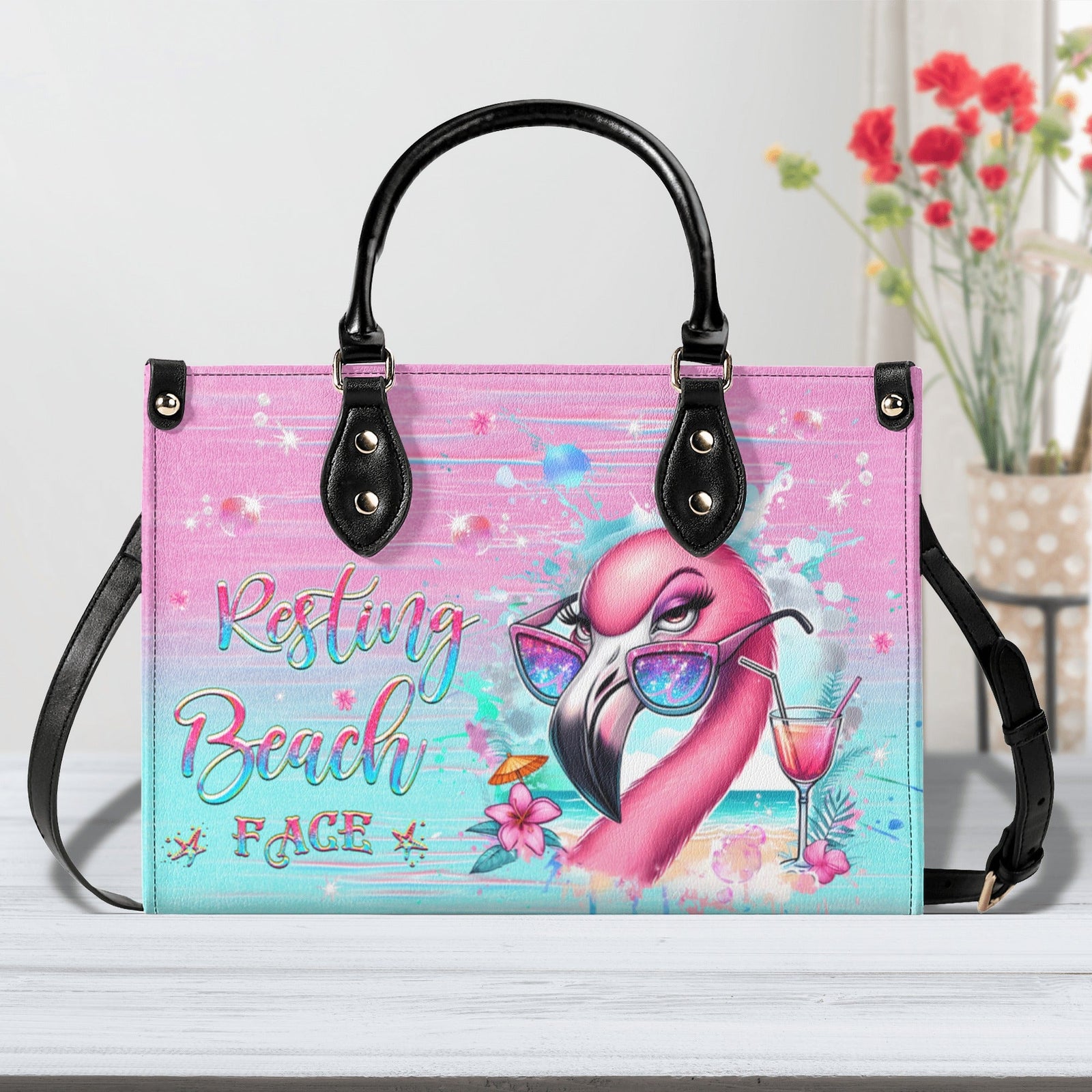 BLISSCORNERS RESTING BEACH FACE FLAMINGO LEATHER HANDBAG