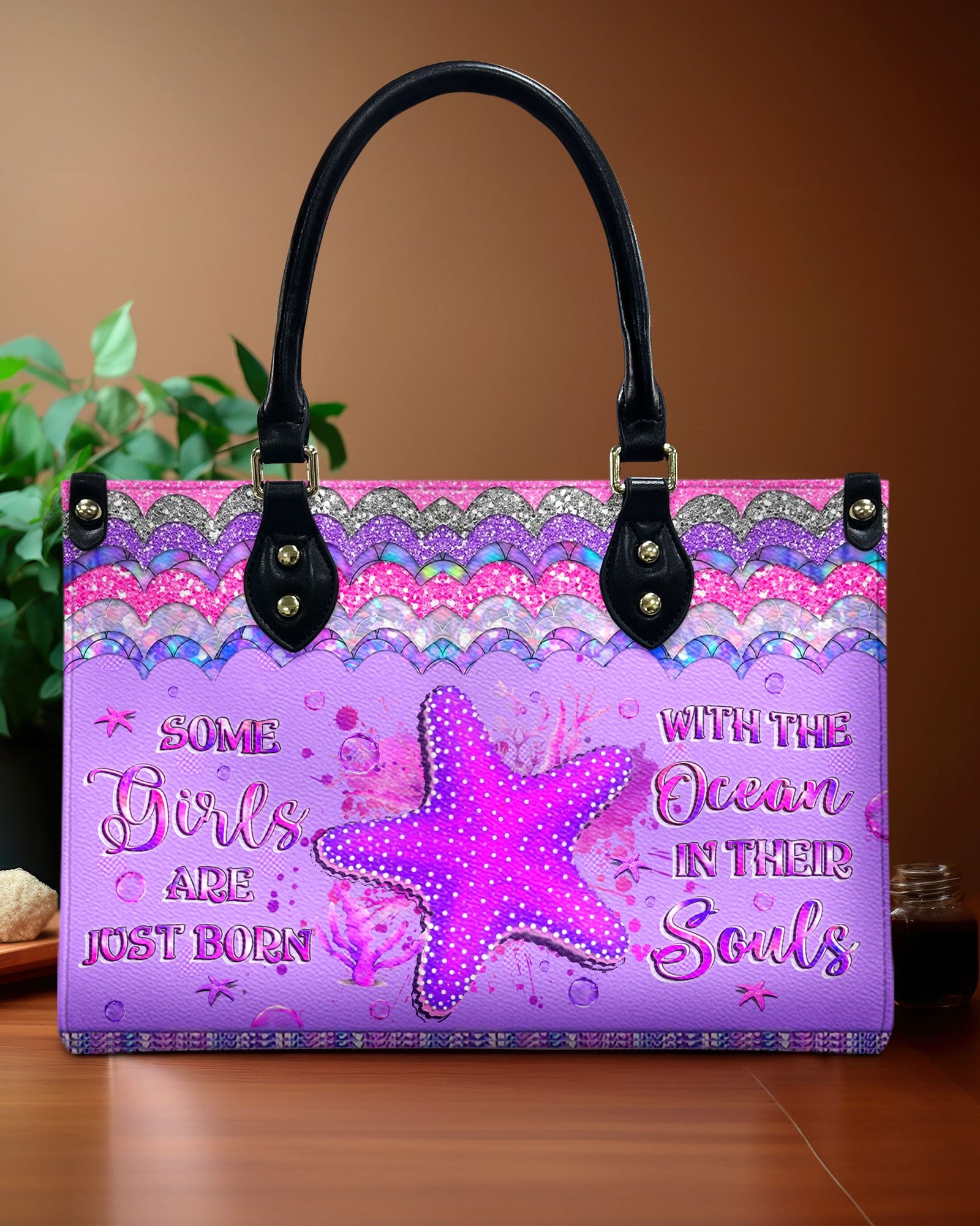 BLISSCORNERS SOME GIRLS ARE JUST BORN STARFISH LEATHER HANDBAG