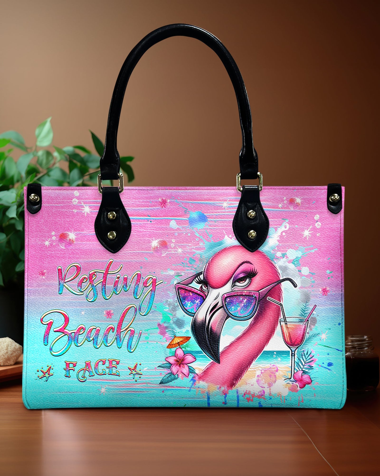 BLISSCORNERS RESTING BEACH FACE FLAMINGO LEATHER HANDBAG