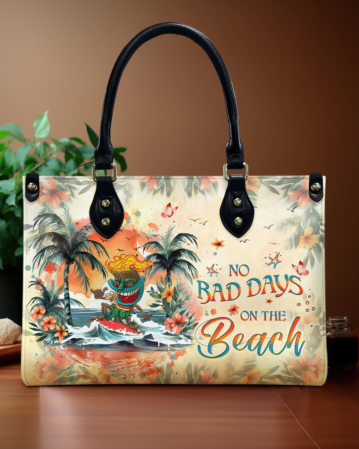 BLISSCORNERS NO BAD DAYS ON THE BEACH TIKI LEATHER HANDBAG