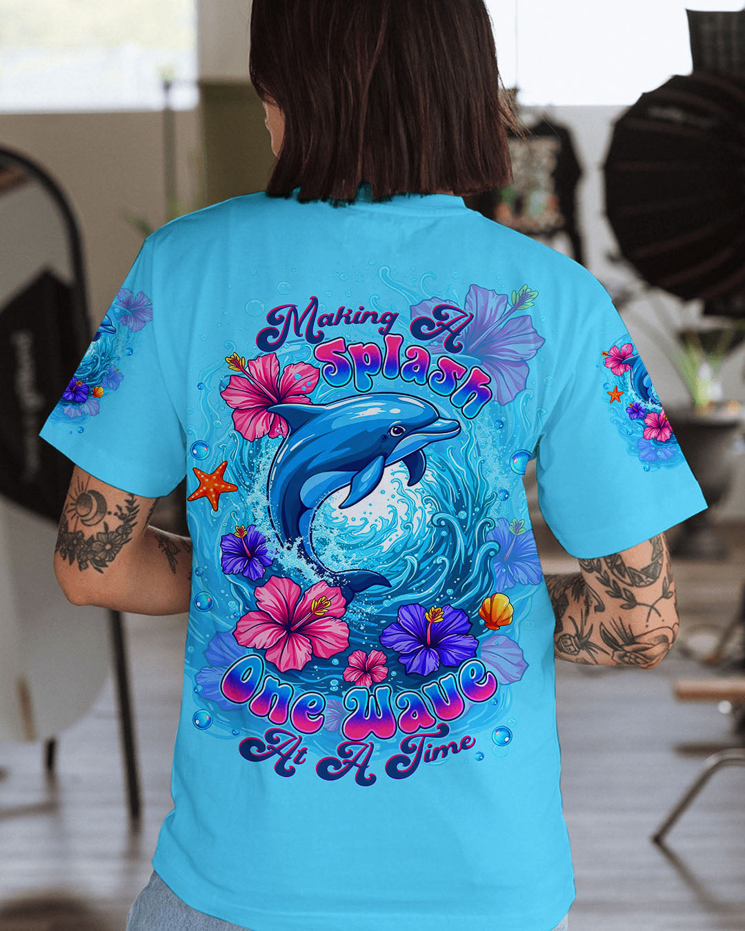 BLISSCORNERS MAKING A SPLASH ONE WAVE AT A TIME DOLPHIN ALL OVER PRINT